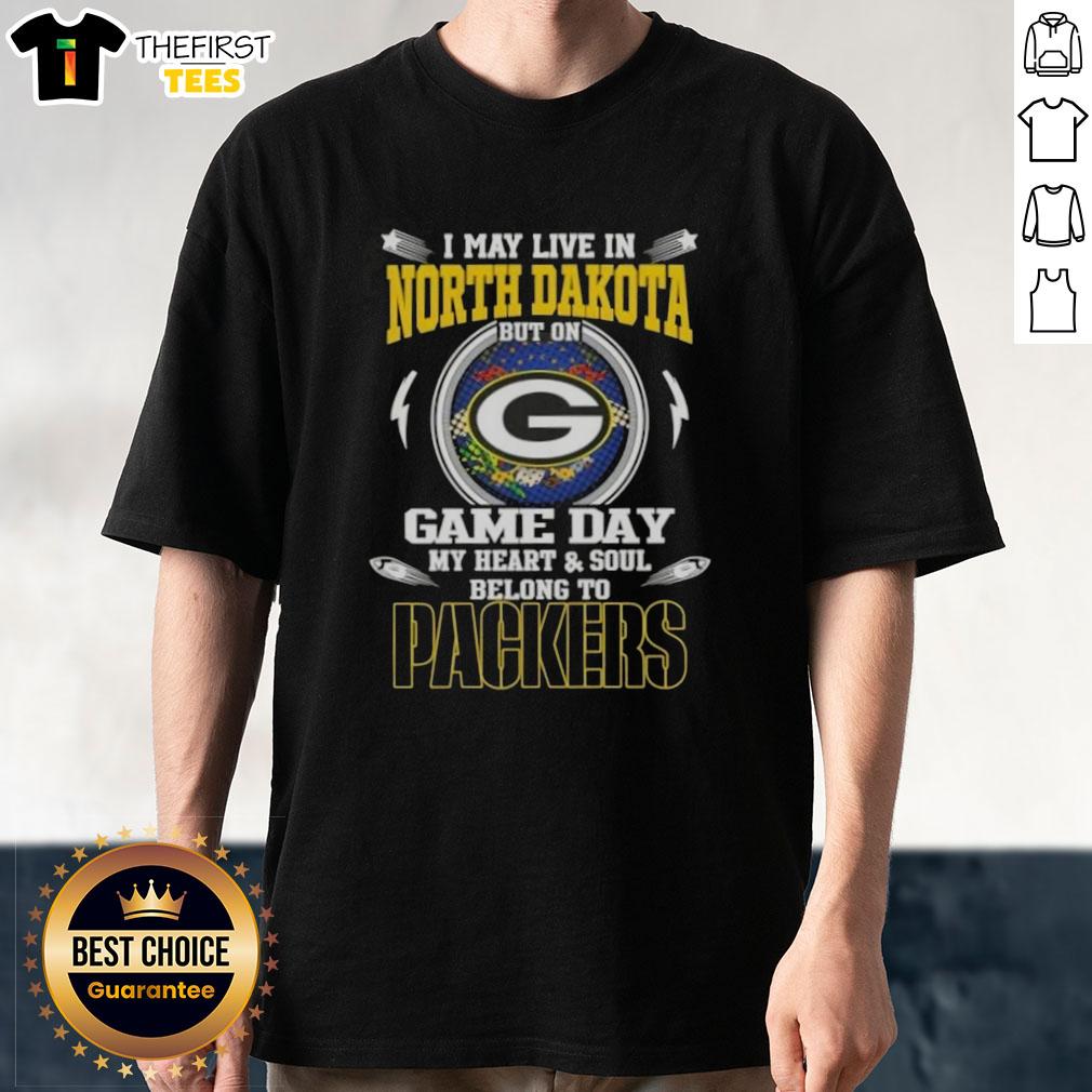Alt Text: Premium I May Live In North Dakota But On Game Day My Heart And Soul Belongs To Green Bay Packers T-Shirt design.