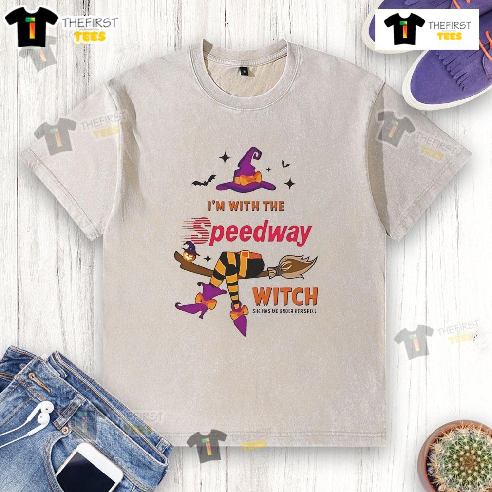 Pretty Speedway Halloween washed t-shirt featuring a witch casting a spell, perfect for festive spooky season attire.