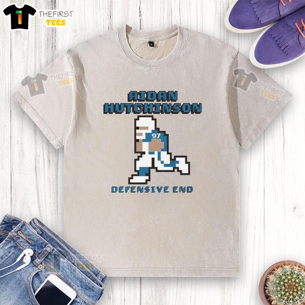 Alt Text: Aidan Hutchinson Detroit Lions Defensive End Pixel Washed T-Shirt featuring team colors and logo, perfect for fans.