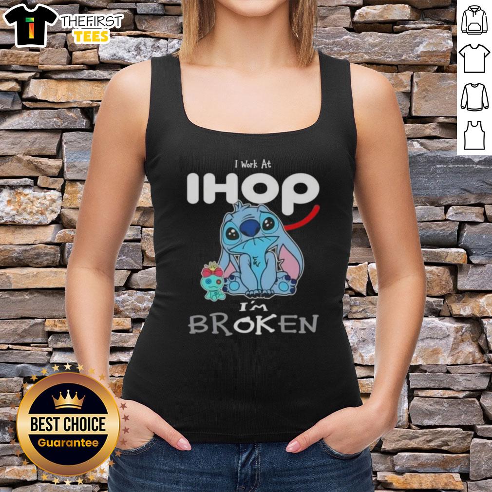 Cute Stitch tank top saying 'I work at IHOP, I'm broken' perfect for fans of Disney and casual wear.