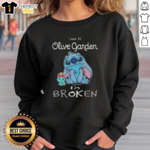 Cute Stitch sweatshirt saying 'I work at Olive Garden, I'm broken' featuring a playful design and cozy style.