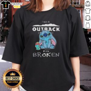 Alt Text: Cute Stitch I Work at Outback Steakhouse I'm Broken Ladies Tee featuring a playful design and vibrant colors.