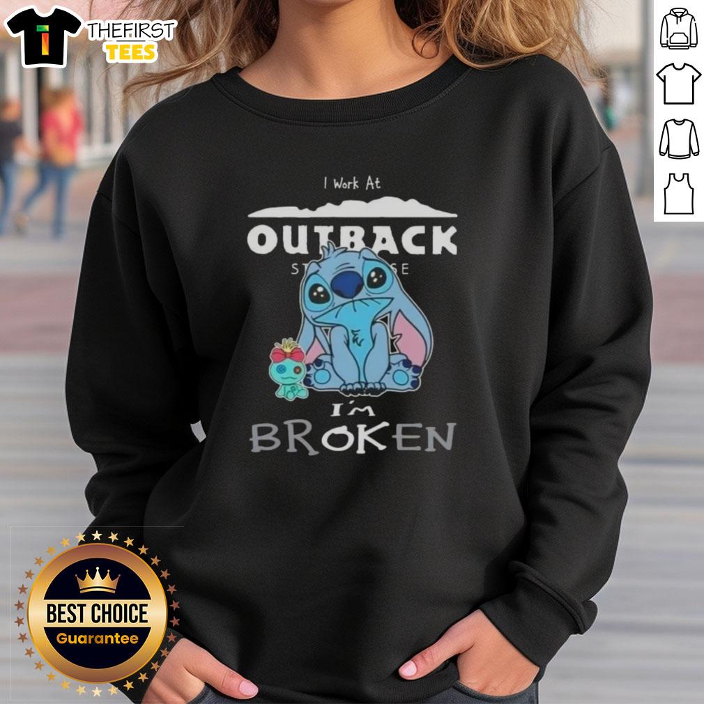 Alt Text: Cute Stitch sweatshirt featuring 'I Work at Outback Steakhouse, I'm Broken' design for casual, fun wear.