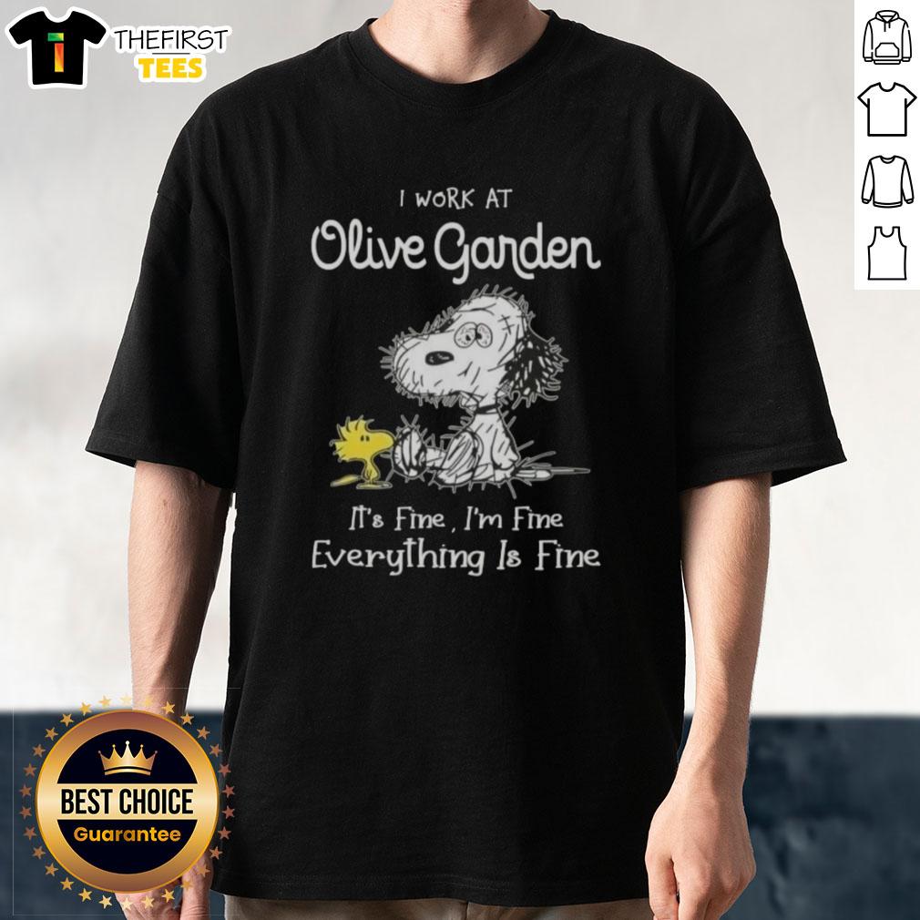 Alt Text: Cute Snoopy and Woodstock on 'I Work At Olive Garden It's Fine' t-shirt, perfect for fans of Peanuts and casual style.
