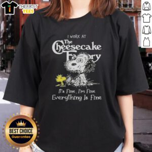 Alt Text: Cute Snoopy and Woodstock graphic on a ladies tee with I work at the Cheesecake Factory, it's fine text.