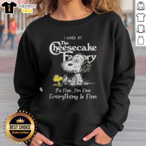 Alt Text: Cute Snoopy and Woodstock on a sweatshirt, featuring the phrase I work at the Cheesecake Factory, it's fine.
