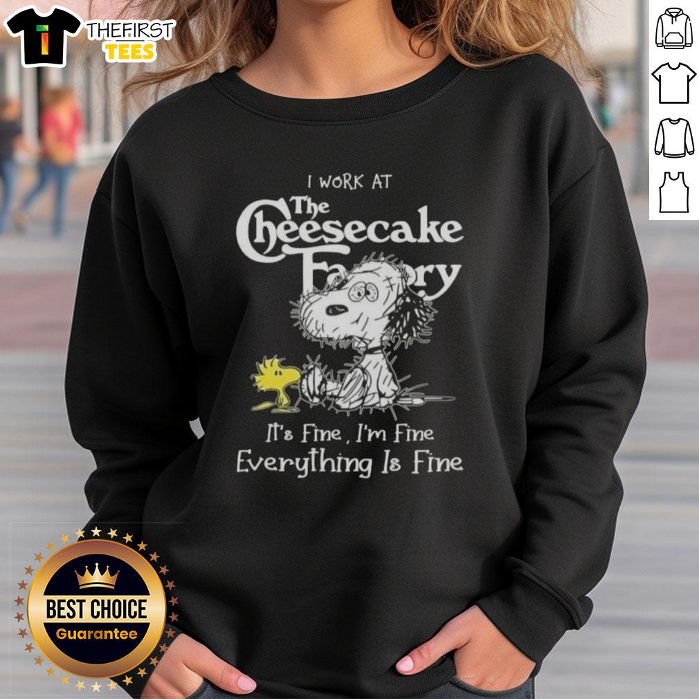 Alt Text: Cute Snoopy and Woodstock on a sweatshirt, featuring the phrase I work at the Cheesecake Factory, it's fine.