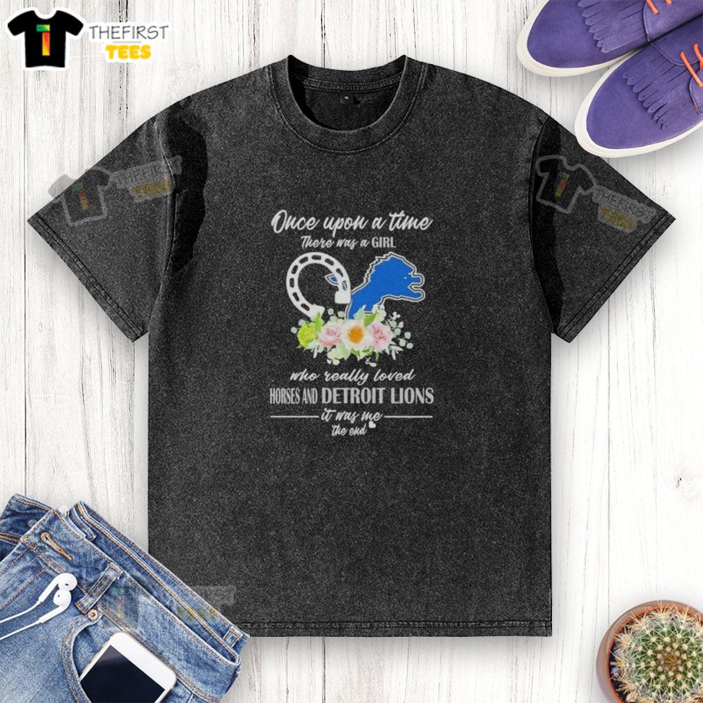 Alt Text: Hot Once Upon a Time There Was a Girl Who Really Loved Horses and Detroit Lions Washed T-Shirt displayed on a hanger.