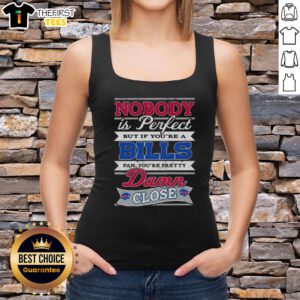 Buffalo Bills fan wearing a 'Nobody Is Perfect But If You're A Buffalo Bills Fan You're Pretty Damn Close' tank top.