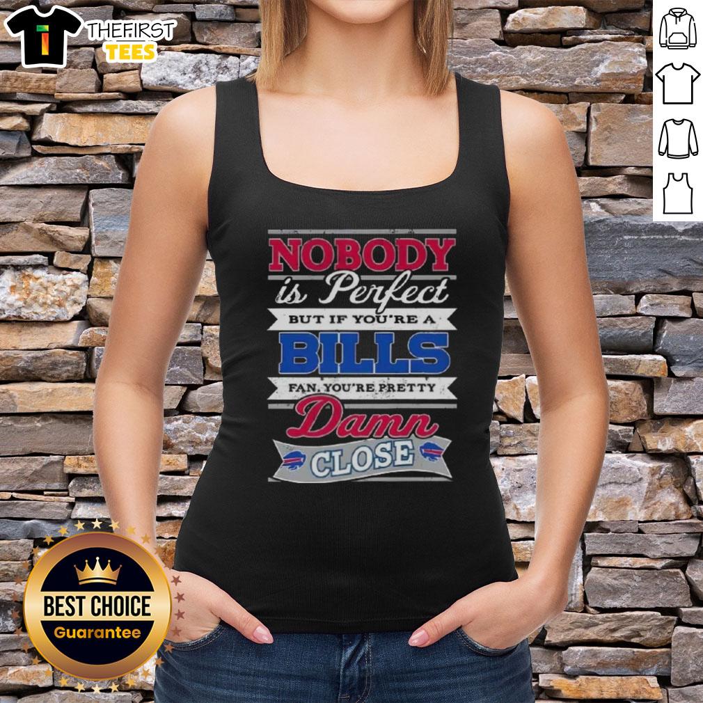 Buffalo Bills fan wearing a 'Nobody Is Perfect But If You're A Buffalo Bills Fan You're Pretty Damn Close' tank top.