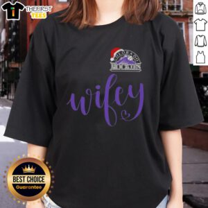 Original Wifey Colorado Rockies Santa Hat Merry Christmas Ladies Tee featuring festive design and team logo.