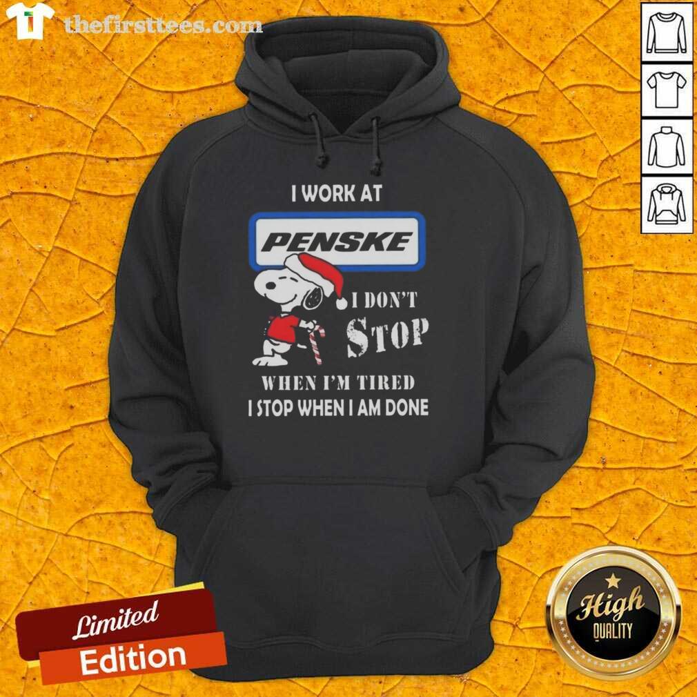 Alt Text: Cute Snoopy hoodie featuring I Work at Penske Corporation slogan, perfect for Christmas and holiday celebrations.