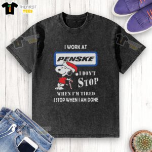 Cute Snoopy I Work At Penske Corporation T-Shirt featuring a motivational quote for Christmas, perfect for holiday gifting.
