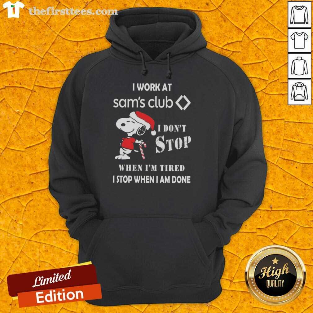 Alt Text: Cute Snoopy Christmas hoodie with 'I Work At Sam's Club, I Don't Stop When I'm Tired, I Stop When I'm Done' slogan.