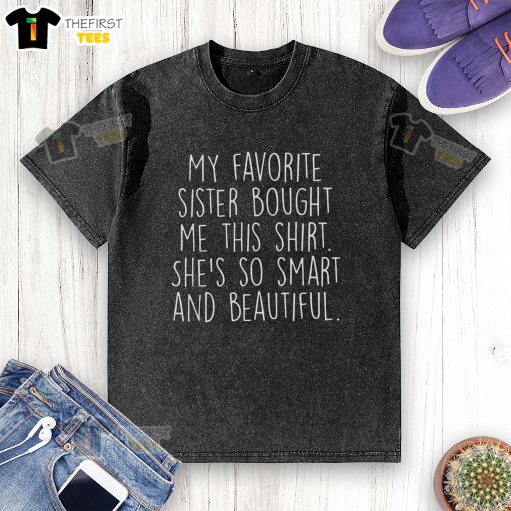 Happy person wearing a washed t-shirt gifted by their favorite sister, showcasing a cheerful moment.