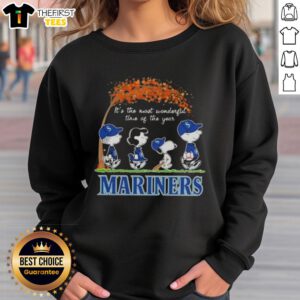 Alt Text: Happy Seattle Mariners X Peanuts Snoopy sweatshirt featuring autumn designs, perfect for the most wonderful time of the year.