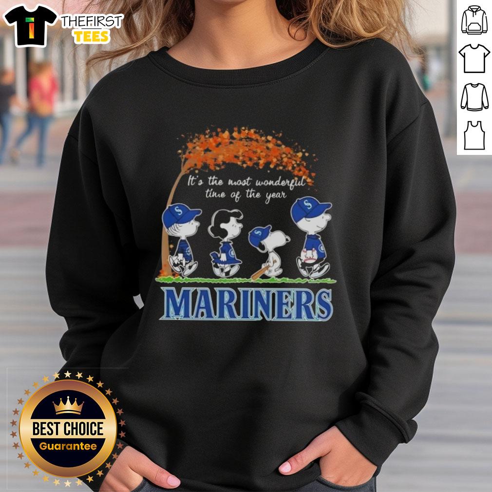 Alt Text: Happy Seattle Mariners X Peanuts Snoopy sweatshirt featuring autumn designs, perfect for the most wonderful time of the year.