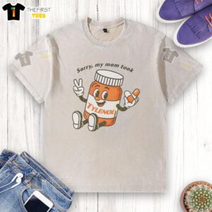 Cartoon design on a washed t-shirt featuring 'Please Be Patient, Sorry My Mom Took Tylenol' message for humorous appeal.