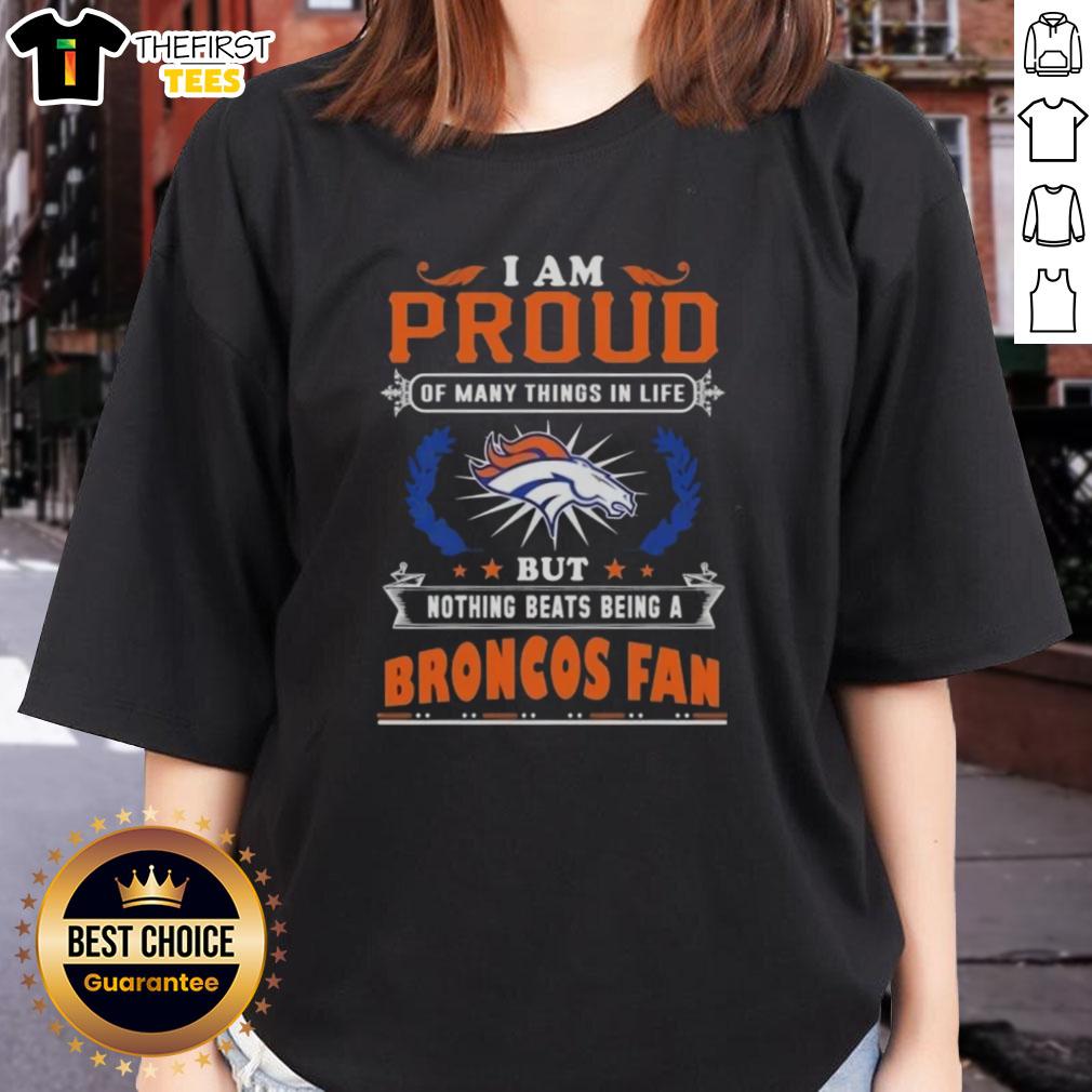 Official 'I Am Proud Of Many Things In Life' Denver Broncos Fan Ladies Tee in vibrant blue and orange colors.
