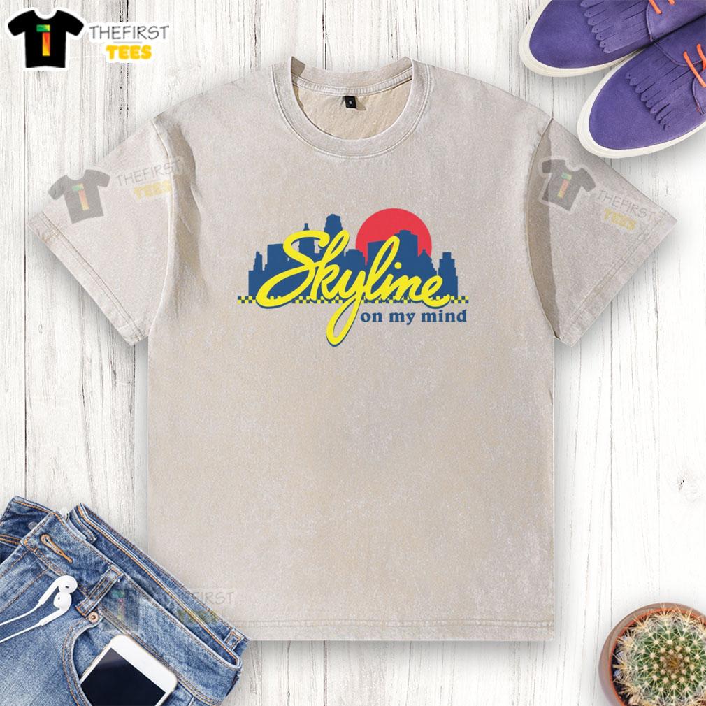 Alt Text: Official Skyline Chili Always On My Mind logo on a washed t-shirt, perfect for fans of Skyline Chili apparel.