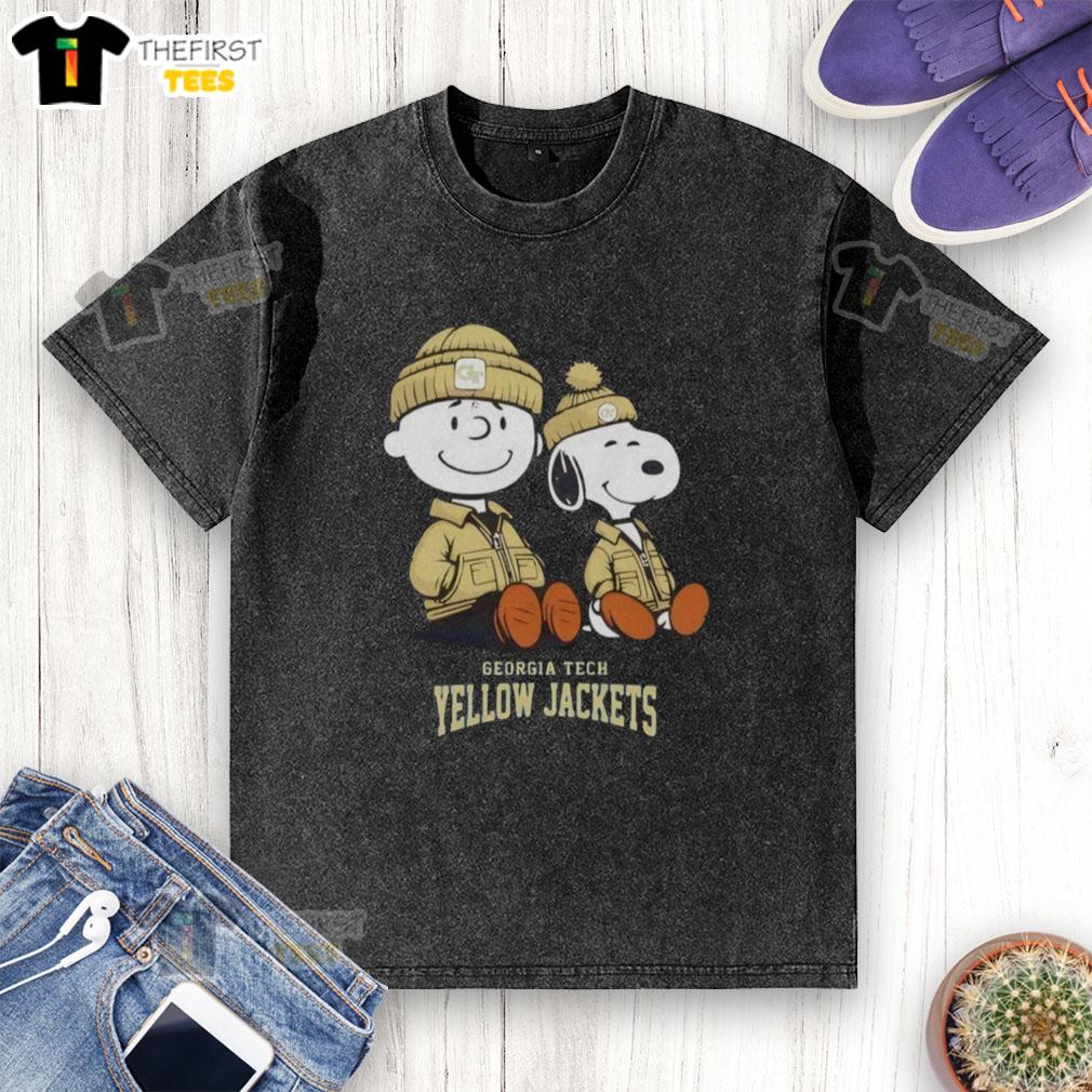 Alt Text: Premium Georgia Tech Yellow Jackets X Snoopy and Charlie Brown washed t-shirt featuring vibrant graphics and comfortable fit.