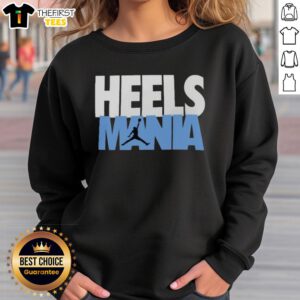 Premium Heels Mania sweatshirt featuring North Carolina Tar Heels logo, perfect for fans and casual wear.