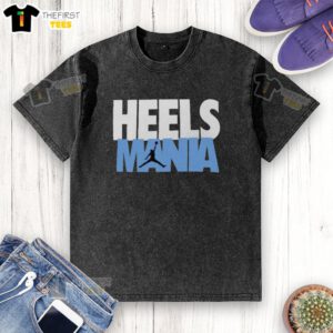 Alt Text: Premium Heels Mania North Carolina Tar Heels logo on a stylish washed t-shirt, perfect for sports fans and casual wear.