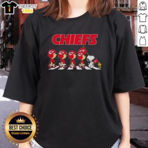 Premium Kansas City Chiefs X Peanuts Snoopy and Friends Abbey Road Ladies Tee featuring iconic characters and team spirit.