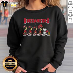 Premium Tampa Bay Buccaneers X Peanuts Snoopy and Friends Abbey Road sweatshirt featuring vibrant graphics and cozy design.