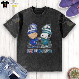 Pretty Charlie Brown fist bump with Snoopy against Philadelphia skyline, featuring 76ers and Eagles, on a washed t-shirt.