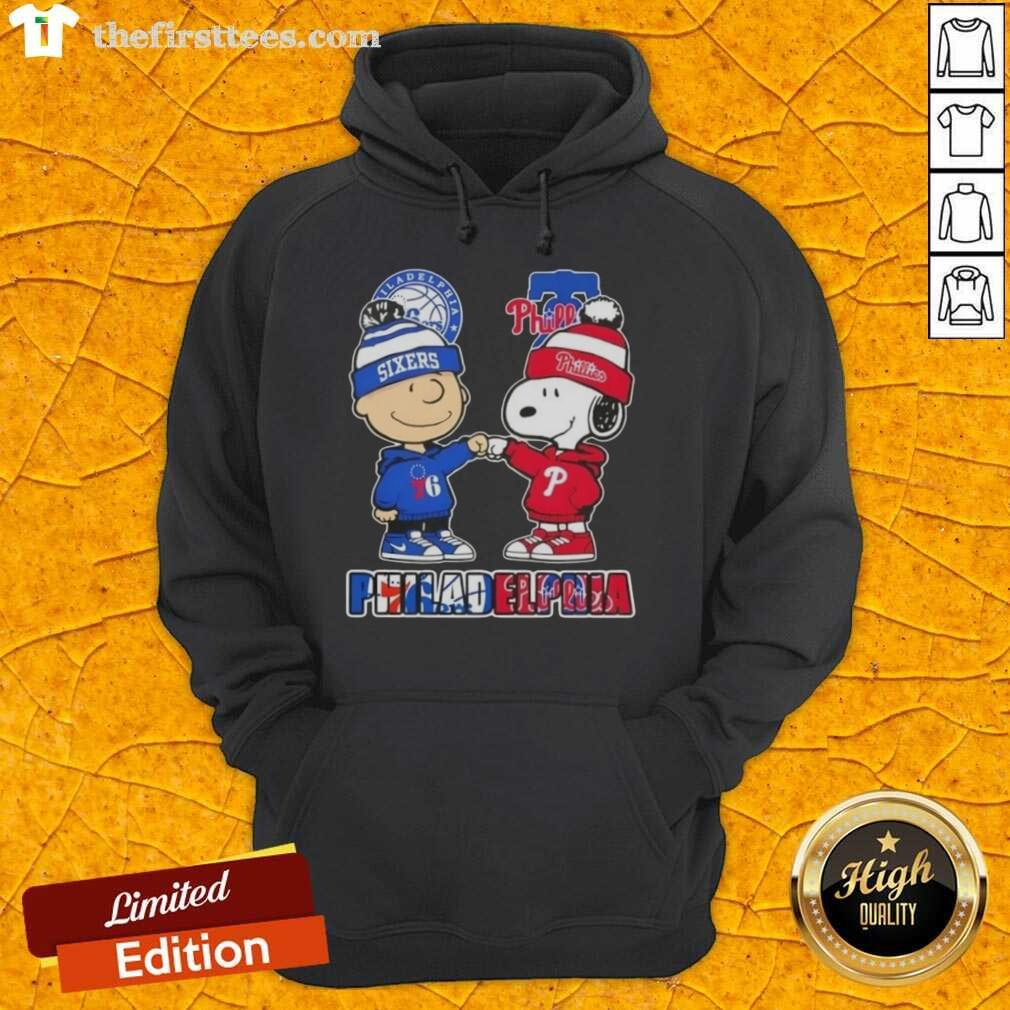 Pretty Charlie Brown fist bump with Snoopy in a Philadelphia sports hoodie for 76ers and Phillies fans.