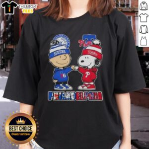 Alt Text: Pretty Charlie Brown fist bump with Snoopy, featuring Philadelphia City Sports 76ers x Phillies ladies tee design.