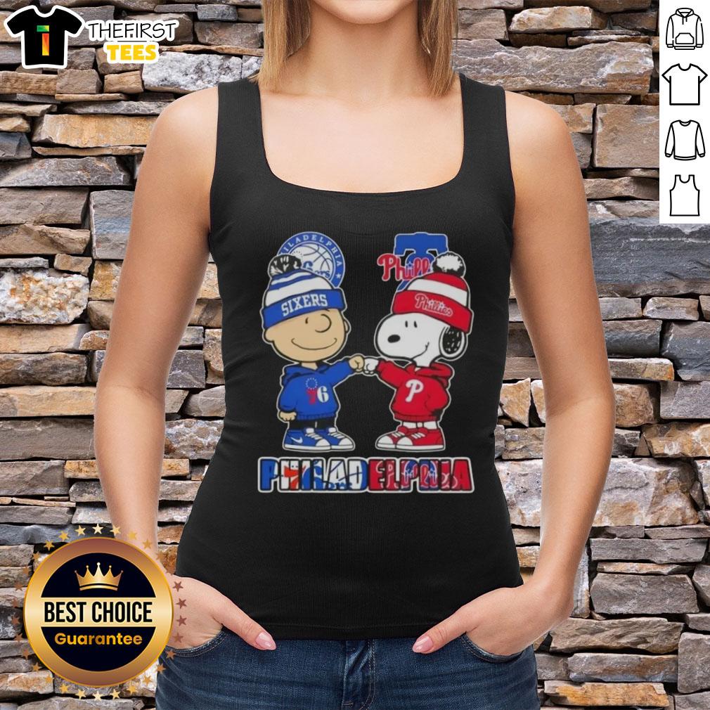 Alt Text: Pretty Charlie Brown fist bump with Snoopy, showcasing Philadelphia sports pride for 76ers and Phillies tank top.