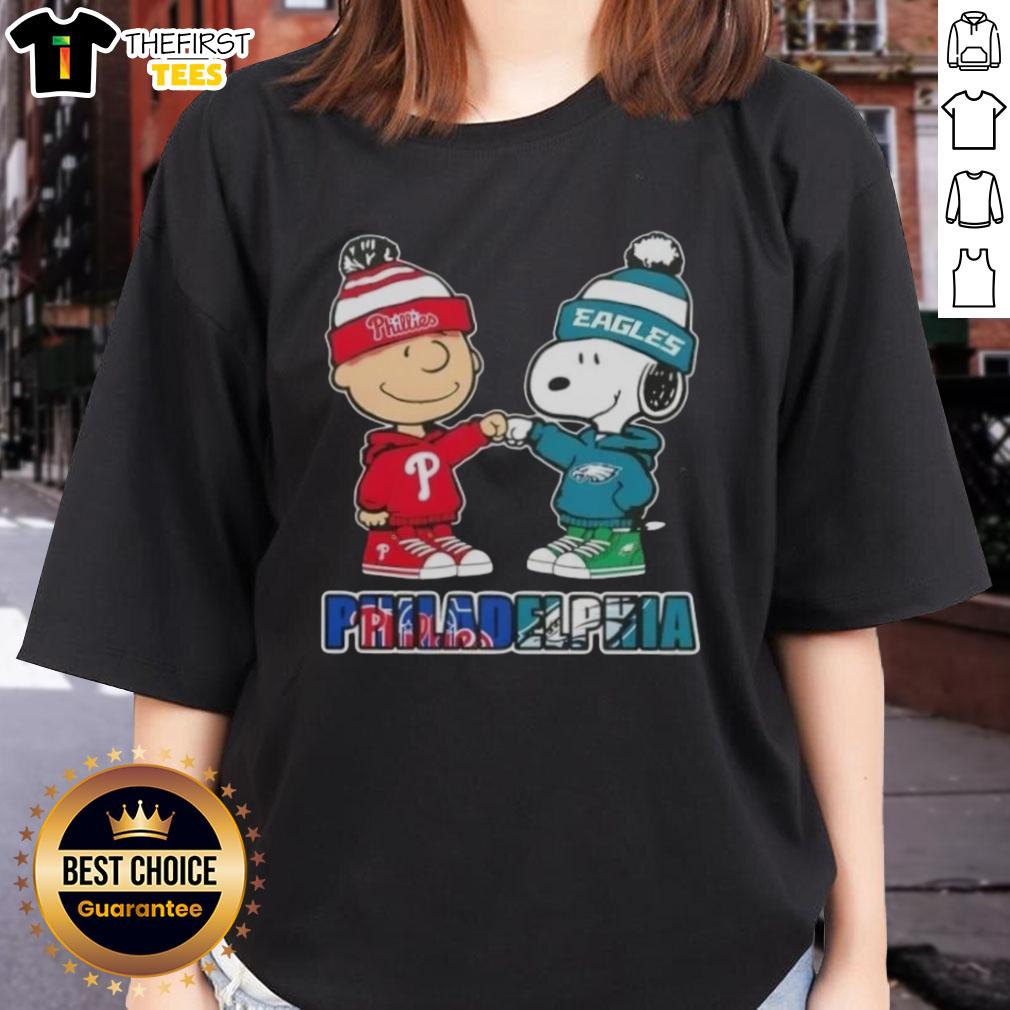 Pretty Charlie Brown fist bump with Snoopy, featuring Philadelphia sports theme on a ladies tee celebrating Phillies and Eagles.