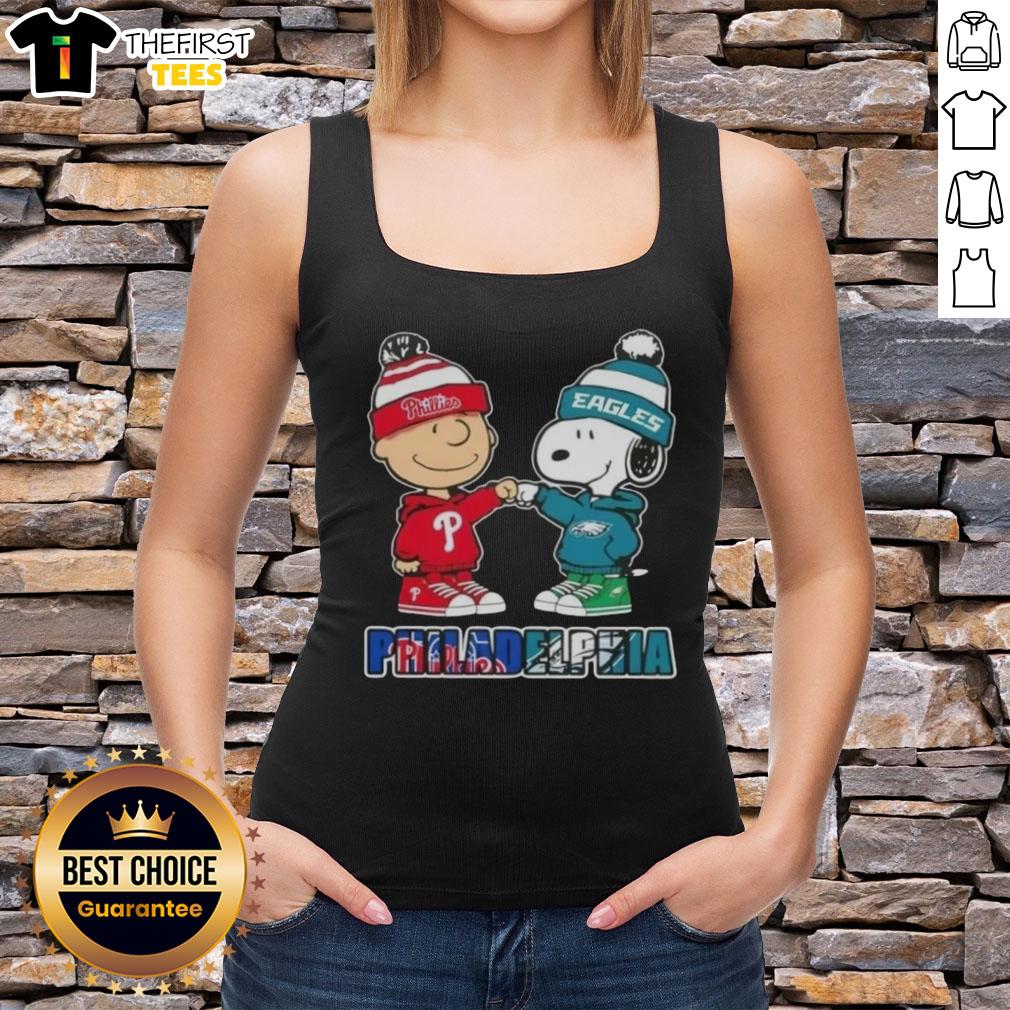 Pretty Charlie Brown fist bump with Snoopy on a Philadelphia City Sports tank top featuring Phillies and Eagles logos.