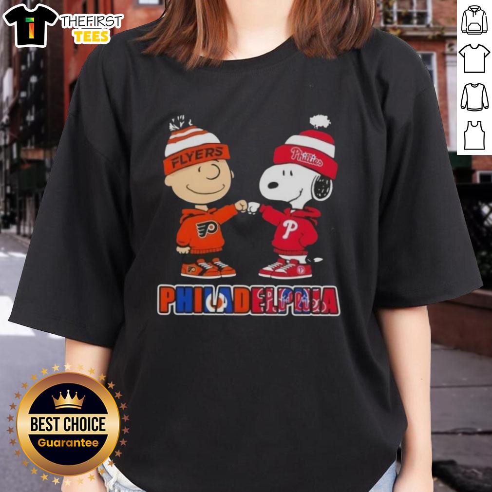 Alt Text: Pretty Charlie Brown fist bump with Snoopy, showcasing Philadelphia City Sports Phillies X Flyers ladies tee.