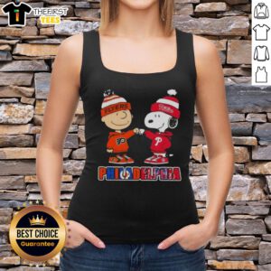 Alt Text: Pretty Charlie Brown fist bump with Snoopy, featuring Philadelphia sports teams Phillies and Flyers on a tank top.