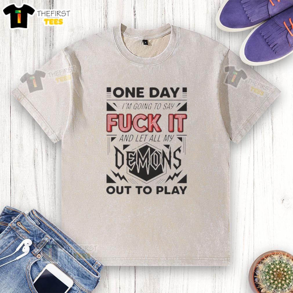 Alt Text: Washed t-shirt with 'Pretty One Day I'm Going to Say F* It Demons and Let All My Out to Play' graphic design.