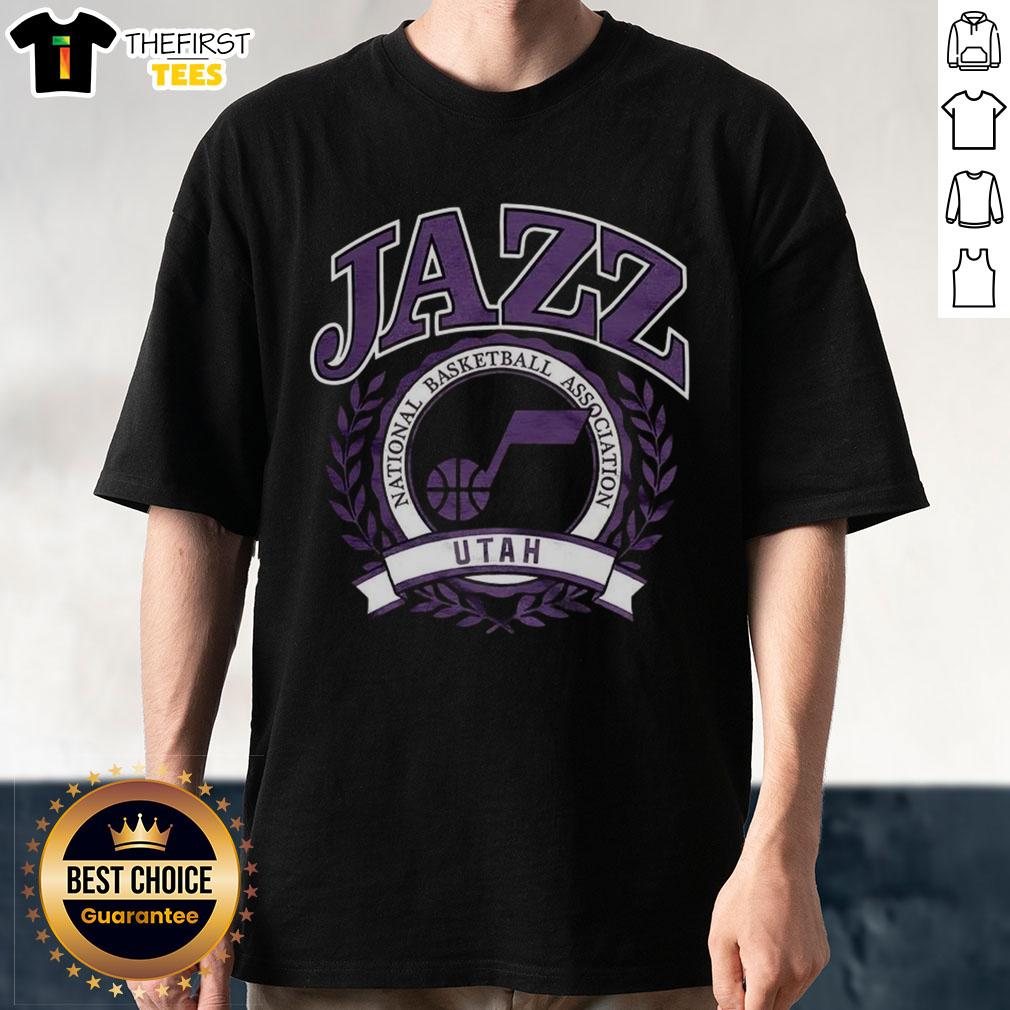 Retro Utah Jazz NBA logo t-shirt with a laurel wreath frame, perfect for basketball fans and collectors.