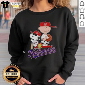 Alt Text: Cozy Washington Nationals x Peanuts sweatshirt featuring Snoopy and Charlie Brown, perfect for baseball fans.