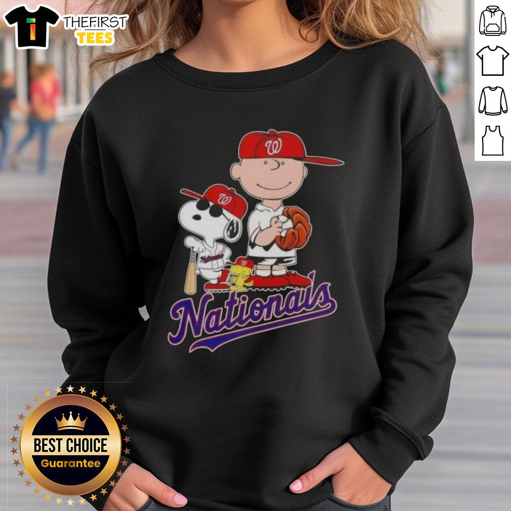 Alt Text: Cozy Washington Nationals x Peanuts sweatshirt featuring Snoopy and Charlie Brown, perfect for baseball fans.