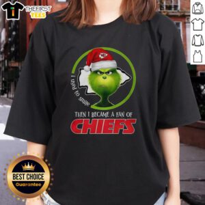 Alt Text: Top Grinch I Used To Smile Then I Became A Fan Of Chiefs Ladies Tee in festive red with playful graphic design.