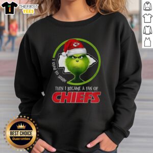 Alt Text: Top Grinch I Used To Smile Then I Became A Fan Of Chiefs Sweatshirt featuring a fun holiday design for fans.