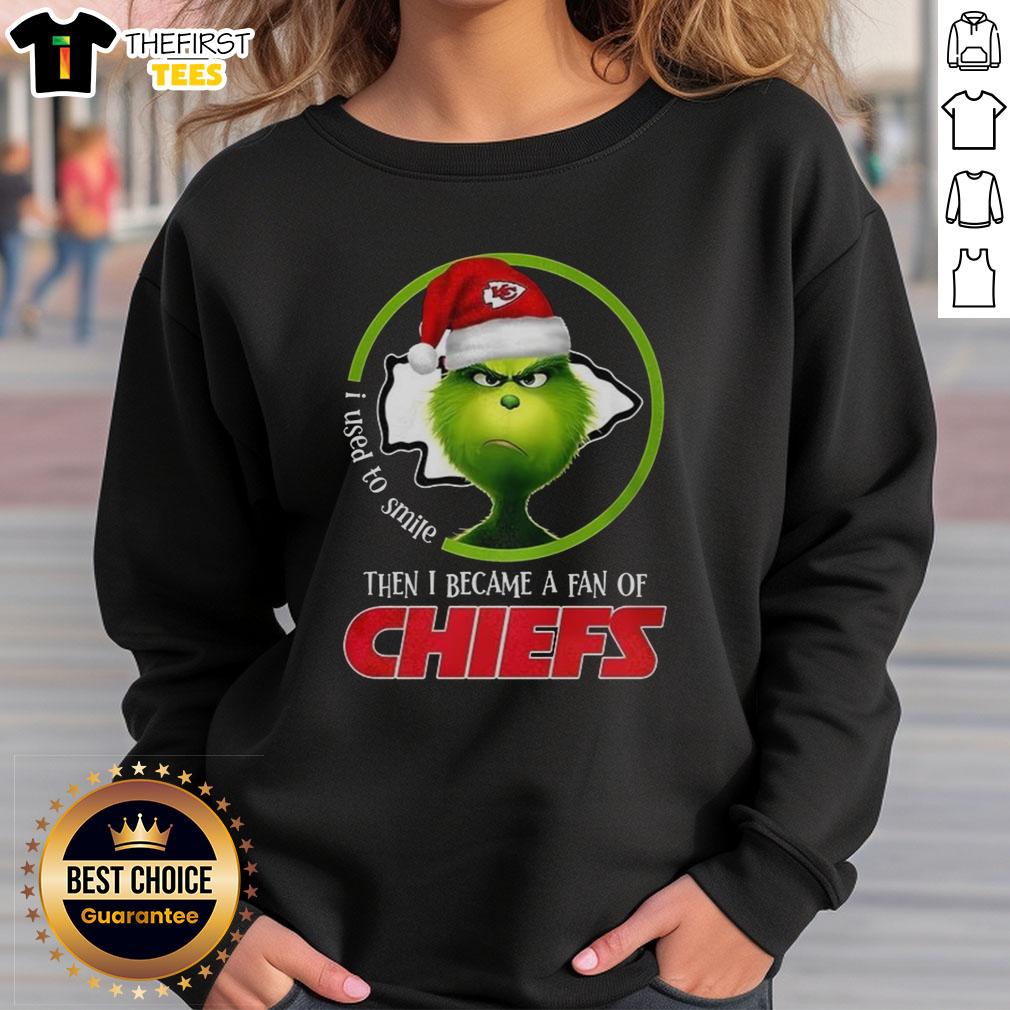 Alt Text: Top Grinch I Used To Smile Then I Became A Fan Of Chiefs Sweatshirt featuring a fun holiday design for fans.