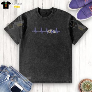 Alt Text: Baltimore Ravens football logo graphic on a washed t-shirt, perfect for fans of the NFL team.