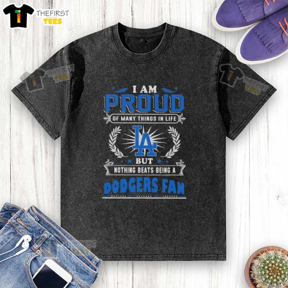 Alt Text: Washed T-shirt featuring the phrase 'Proud to be a Los Angeles Dodgers fan' celebrating team loyalty and spirit.