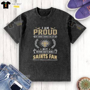 New Orleans Saints fan proudly wearing a washed T-shirt, showcasing love for football and team spirit.