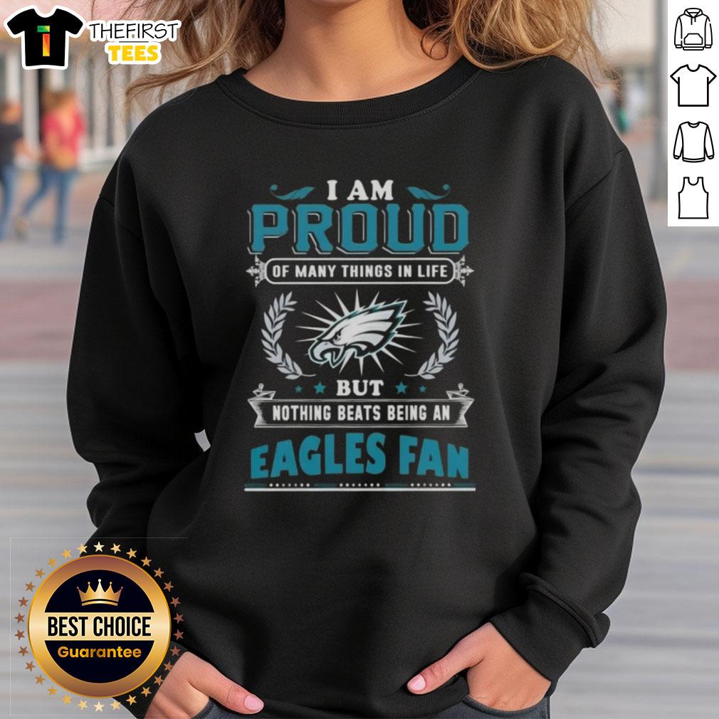 Cozy sweatshirt featuring 'I Am Proud Of Many Things But Nothing Beats Being A Philadelphia Eagles Fan' design.