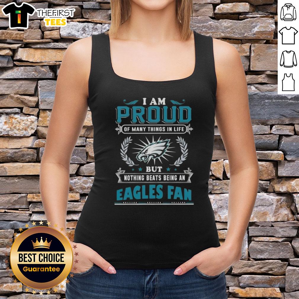 Alt Text: Woman wearing a tank top that says 'Proud to be a Philadelphia Eagles Fan' showcasing team spirit.