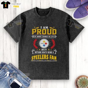 Alt Text: Pittsburgh Steelers fan proudly wearing a washed t-shirt that reads 'I am proud of many things in life, but nothing beats being a Steelers fan.'